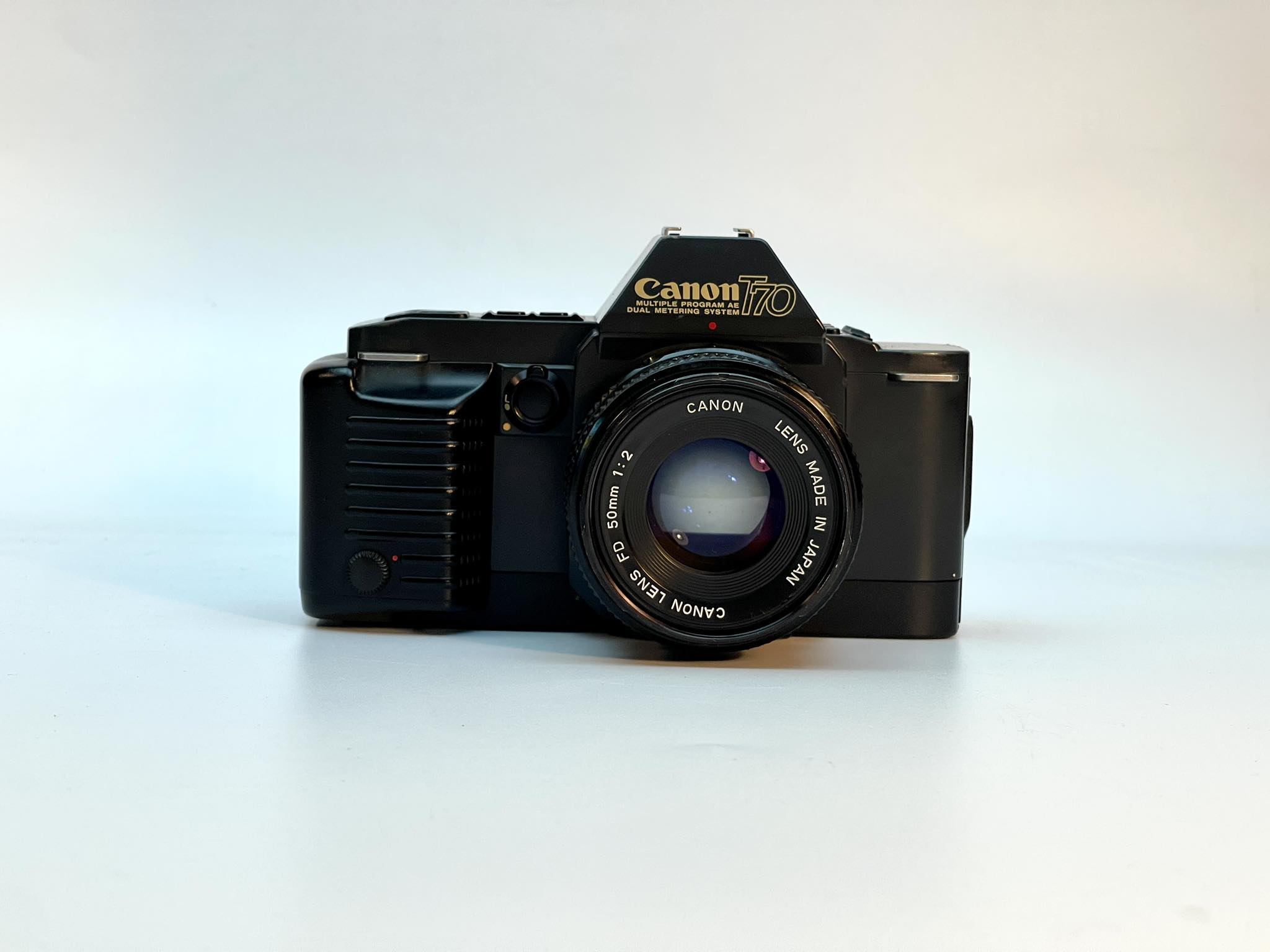 CANON T70+ CANON LENS FD 50MM.F2
