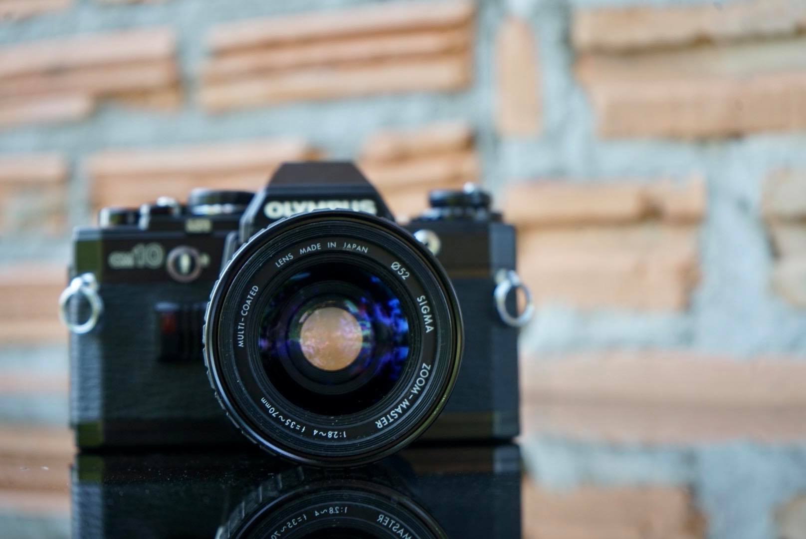 OLYMPUS OM10 SIGMA ZOOM-MASTER 35-70MM.F2.8-4
