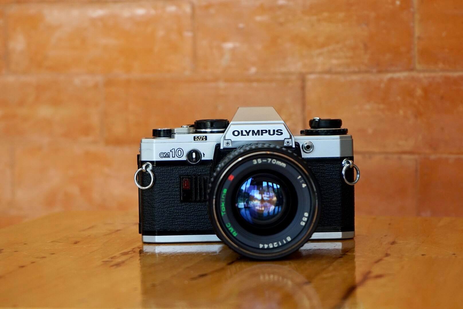 OLYMPUS OM10 + LENS TOKINA 35-70MM. 1:4