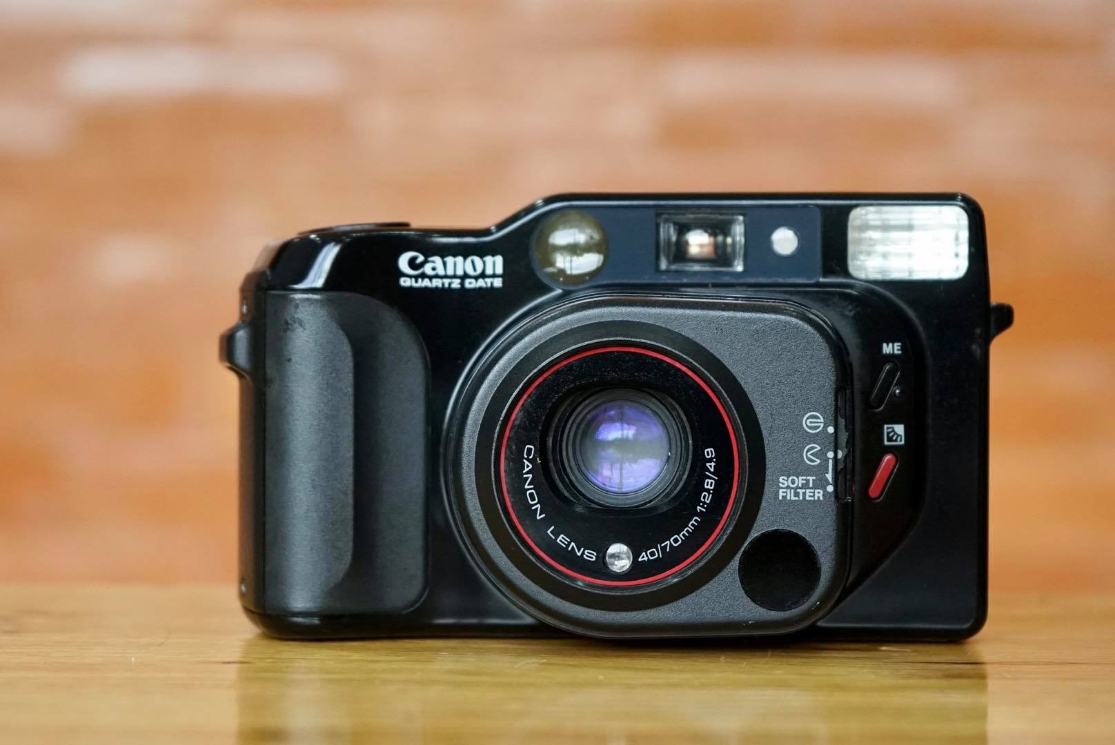 CANON AUTOBOY TELE QUARTZ DATE CANON LENS 40/70MM.F2.8/4.9
