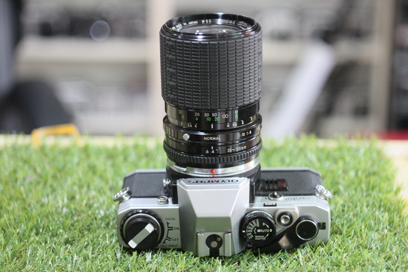 OLYMPUS OM10 SIGMA ZOOM-@II 35-105MM.F3.5-4.5 MULTI COATED