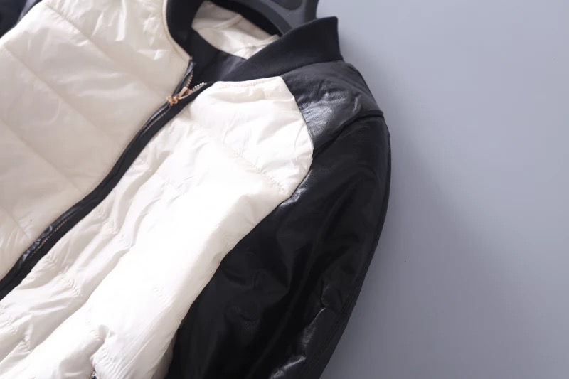เสื้อกันหนาว แจ็คเก็ตกันหนาว สีทูโทนขาว-ดำ สไตล์ Bomber jacket แต่งแขนหนัง งานสวย แนวๆเท่ห์ๆคะ size L