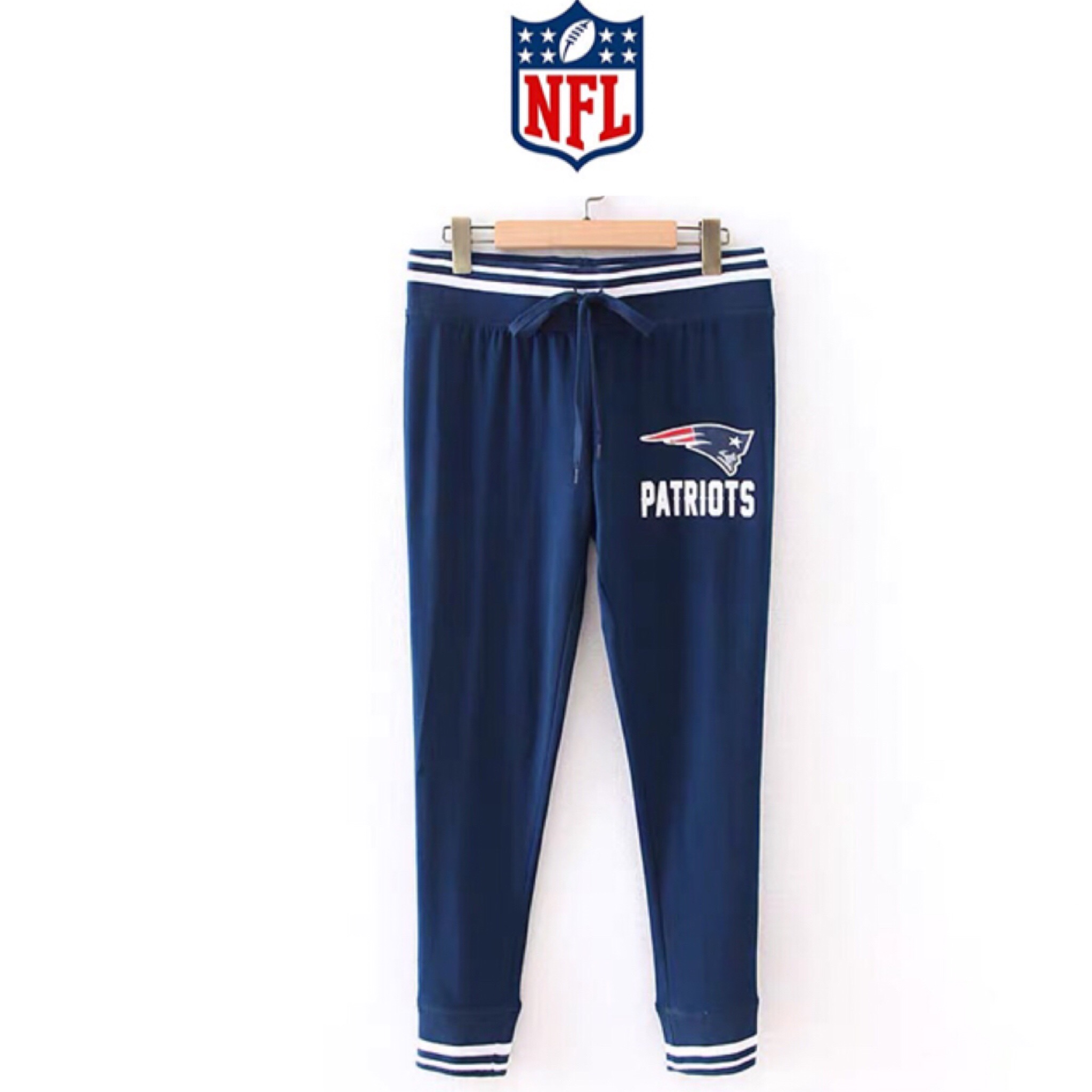 NFL apparel กางเกงวอร์ม กางเกงผ้านืด เนื้อspandex สีน้ำเงิน แต่งขาจั๊ม งานแบรนด์ NFL TEAM น้ำเงิน