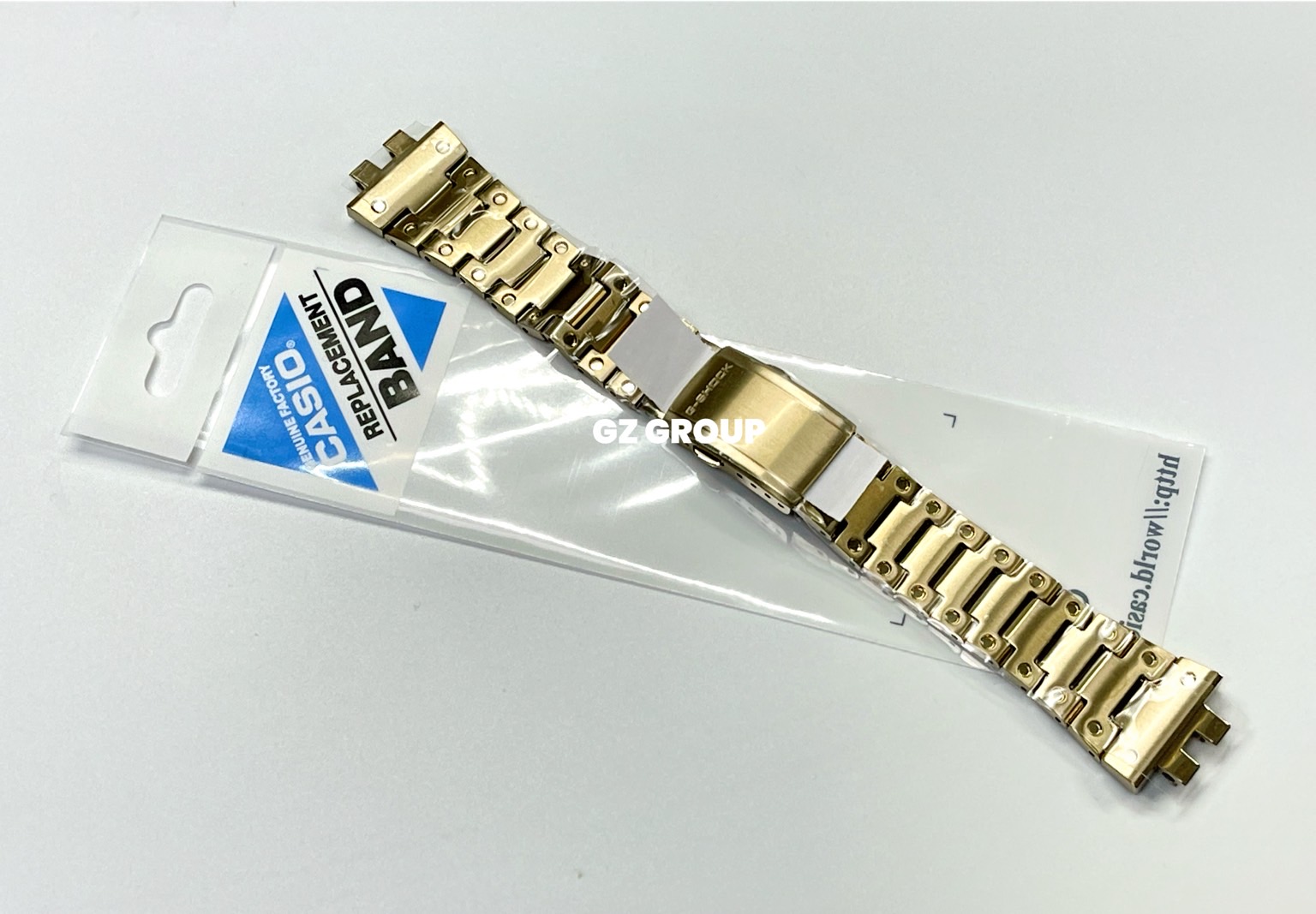 CASIO GENUINE FACTORY CASIO REPLACEMENT อะไหล่นาฬิกา G-SHOCK รุ่น GMW-B5000GD-9 กรอบสายสีทอง