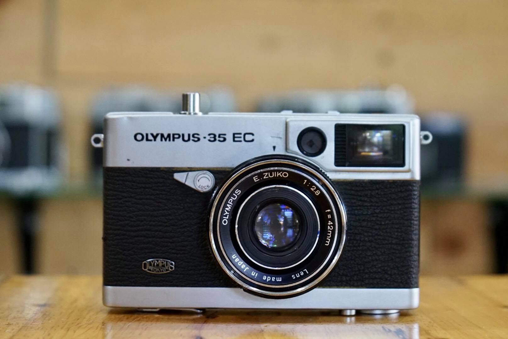 OLYMPUS 35 EC OLYMPUS E. ZUIKO 42MM. F2.8