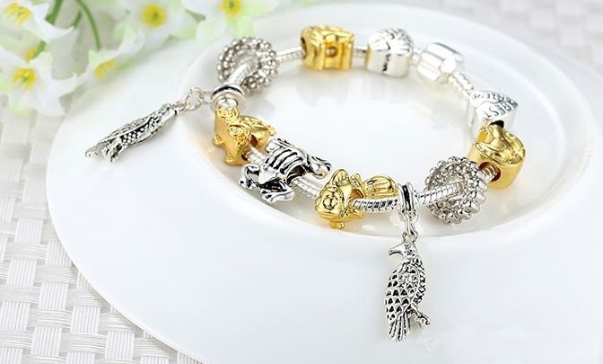 สร้อยข้อมือ Diy สร้อยข้อมือ Charm สไตล์ Pandora ทอง สลับ เงิน ชาร์ม ตัว รถทอง กบเงิน ปลาทอง ห้อย จี้ นกแก้ว สีเงิน ของขวัญให้แฟน สุดหรู 984346