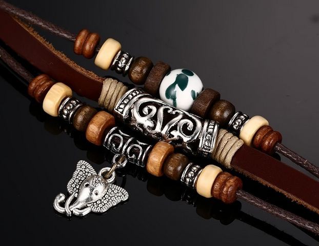 สร้อยข้อมือ หนังแท้ สไตล์วินเทจ สร้อยข้อมือ Hand made ผู้หญิง ผู้ชาย ใส่ได้ ร้อยด้วย ลูกปัดไม้ จี้ช้าง ผสมผสาน ลวดลาย เงินโบราณ 719480