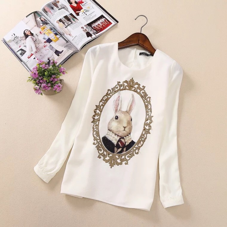 เสื้อเชิ้ต ชีฟองสีขาว แต่งแขนตุ๊กตา แต่ง ลายกำมะหยี่รูปกระต่าย เนื้อผ้าทิ้งตัว สวยมากคะ ขาว