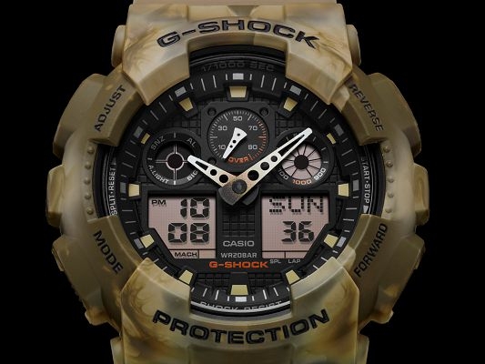 CASIO G-SHOCK นาฬิกาข้อมือ นาฬิกากันน้ำ นาฬิกาของแท้ ประกันศูนย์ CMG 1 ปี รุ่น GA-100MM-5A นาฬิกาสีน้้ำตาล