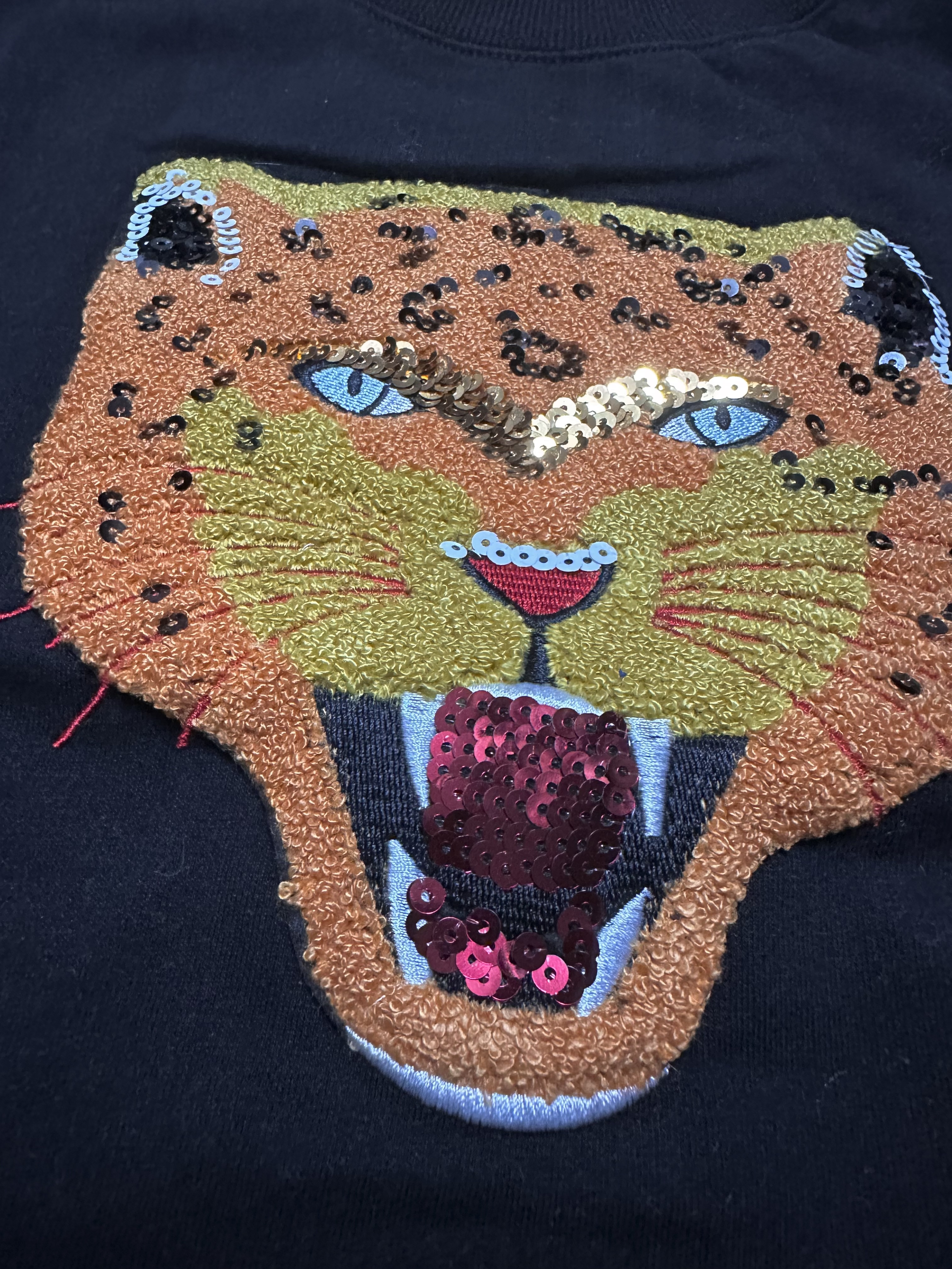 เสื้อหนาวไหมพรม สีดำ ลายปักเลื่อม หน้าเสือ FELINE เนื้อผ้ายืด นุ่ม สวย งานญี่ปุ่น sinsay คะ Size L