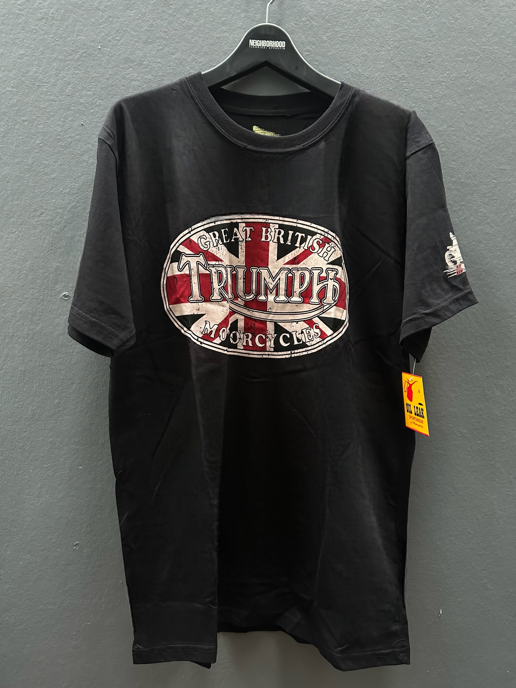 Oil leak เสื้อยืดแขนยาว คอกลม เสื้อยืด Triumph สีดำ ลายสัญลักษณ์ อังกฤษ ผู้ชาย แบรนด์ OIL LEAK Size M/L/XL ดำ