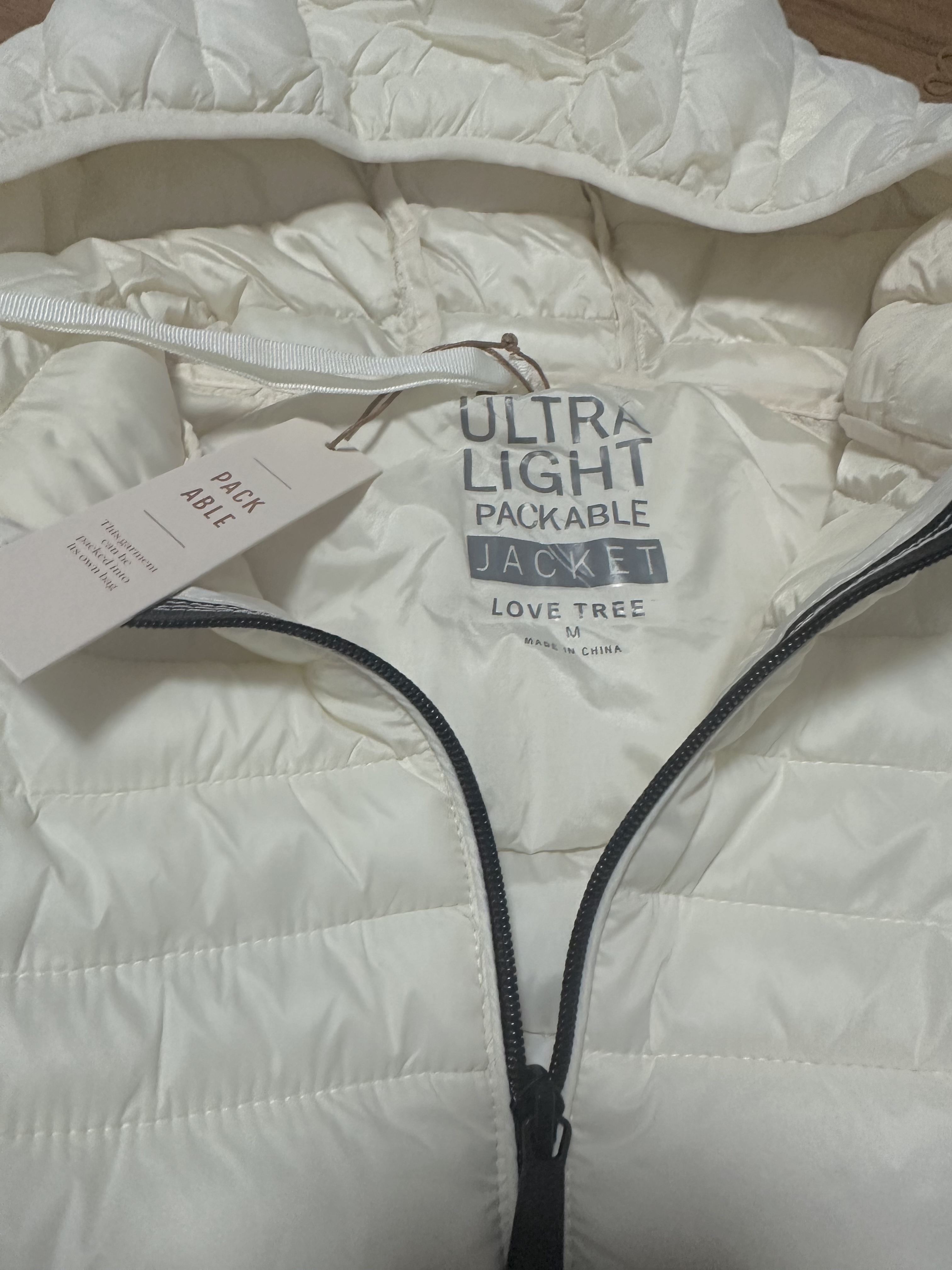 Love tree เสื้อกันหนาว บุนวมอุ่น แบรนด์ LOVE TREE ultra light packable (Padded puffer coat สำเนา สำเนา สำเนา