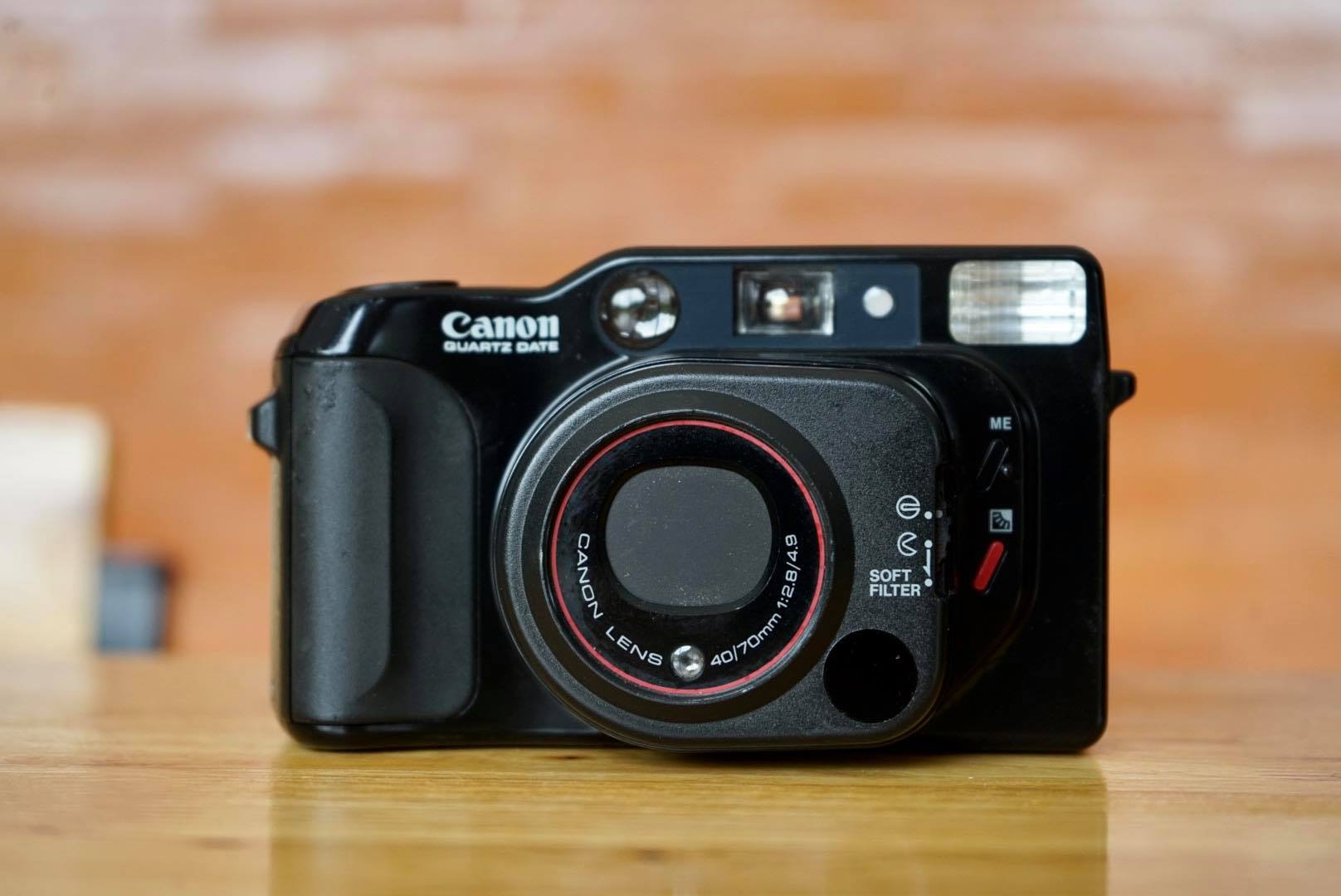 CANON AUTOBOY TELE QUARTZ DATE CANON LENS 40/70MM.F2.8/4.9