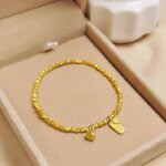 สร้อยข้อมือ กำไลข้อมือ ทองชุบ 18 k ดีไซน์ เป็นหินลูกปัด ทอง ร้อยแบบยืดได้ พร้อม จี้ดอกบัว 807913