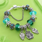 สร้อยข้อมือ Diy สร้อยข้อมือ สไตล์ แพนโดร่า ร้อยเม็ดบีด ลาย นกฮูก พร้อมตุ้งติ้ง เข้าชุด ใส่คริสตรัลสีเขียว 603114