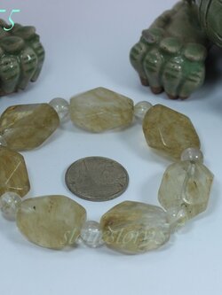 กำไลมหาเศรษฐ๊ไหมทอง(ขายแล้ว) (เม็ดเหลี่ยมขนาด กว้าง 1.6**ยาว2.1**หนา0.9 ซม.)