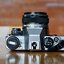 OLYMPUS OM10 OLYMPUS OM-SYSTEM F. ZUIKO AUTO-S 50 MM. F1.8 MANUAL ADAPTER