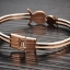 กำไลข้อมือผู้หญิง กำไลทอง 18 K สี Rose Gold ยอดฮิต กำไลข้อมือ ลาย ปลาคู่ สำหรับ ราศี กุมถ์ และ มีน ฝังเพชร CZ ที่ตา สวยหรู มีสไตล์ 398187